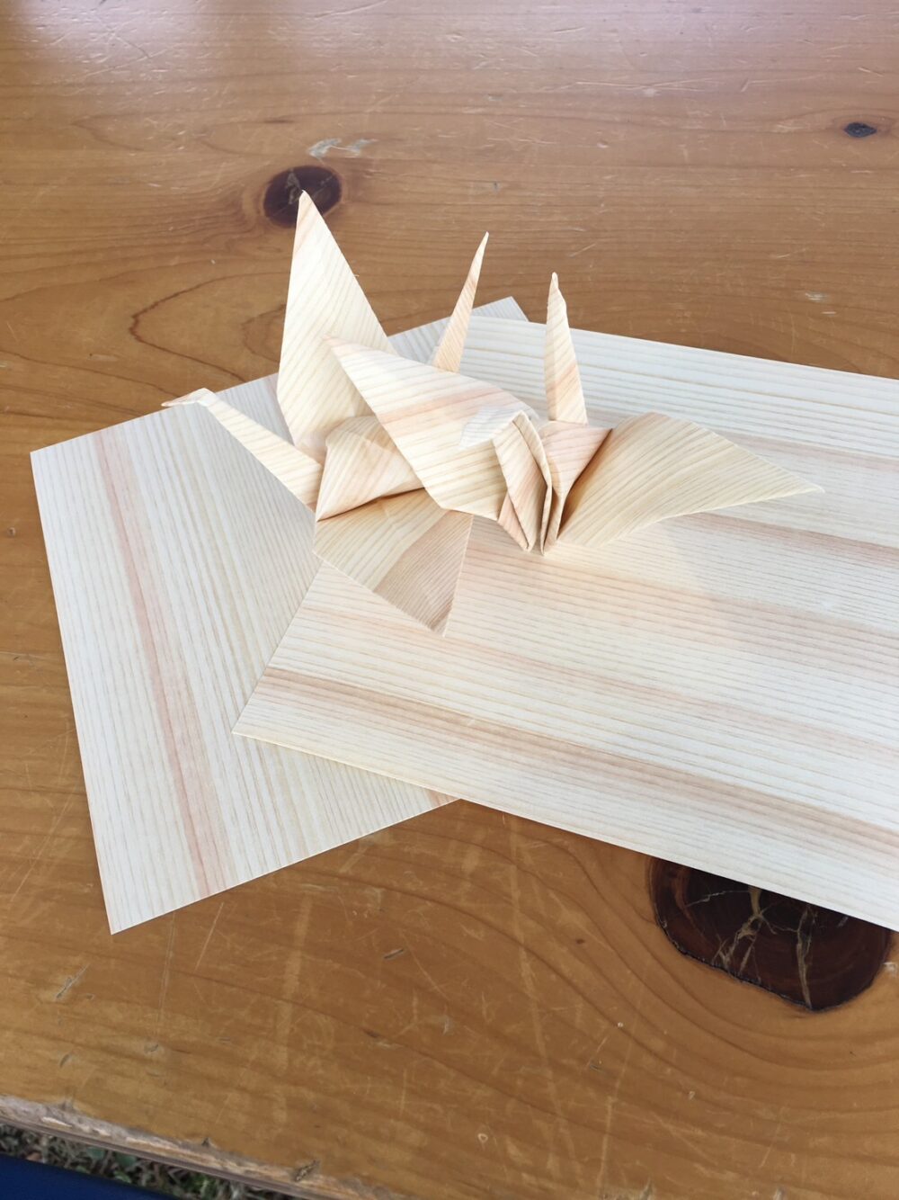 Thousand paper cranes project with wooden origami